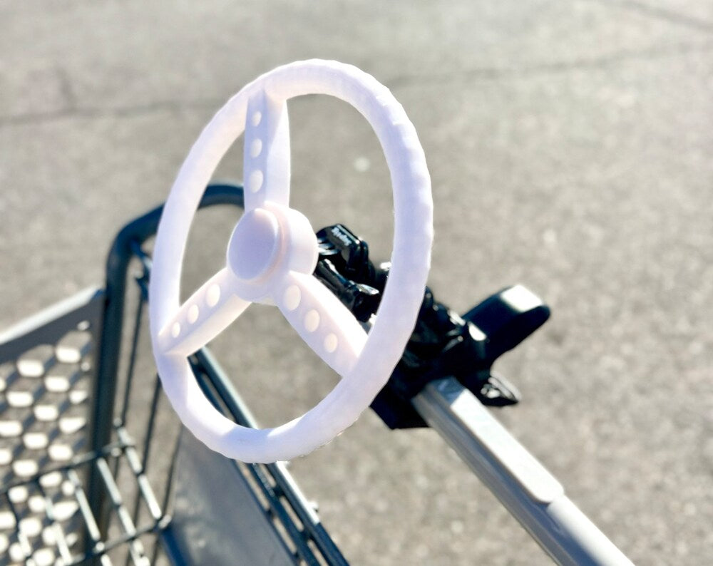 Clip on toy steering wheel wagon accessory